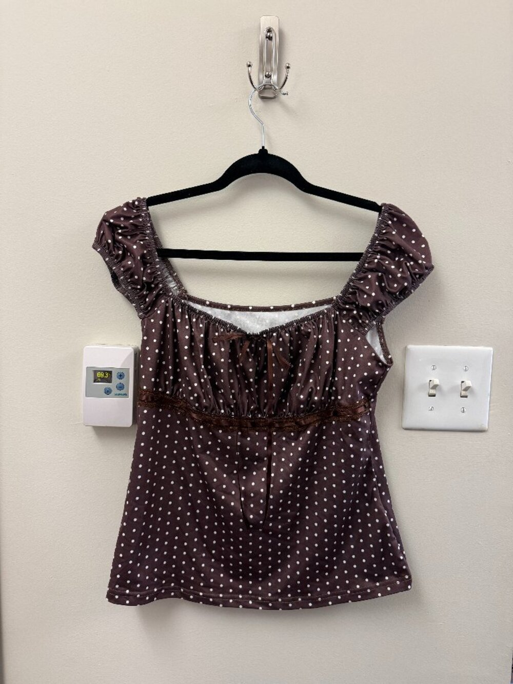 brown top with white polka dots